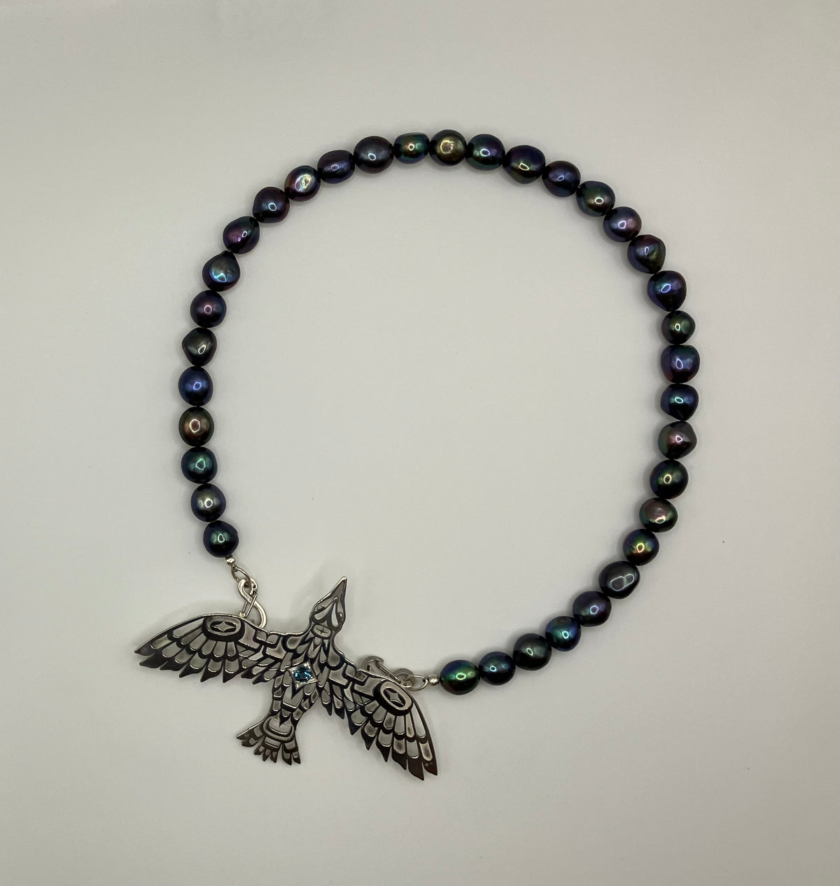 Raven Pendant "Creators View of Raven" on black fresh water pearls - sterling silver clasps
