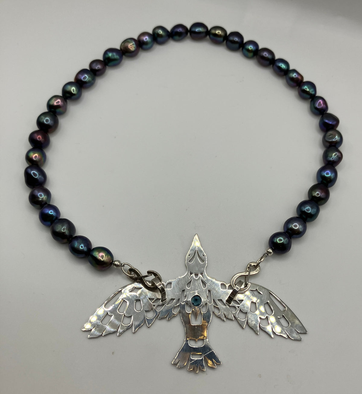 Raven Pendant "Creators View of Raven" on black fresh water pearls - sterling silver clasps